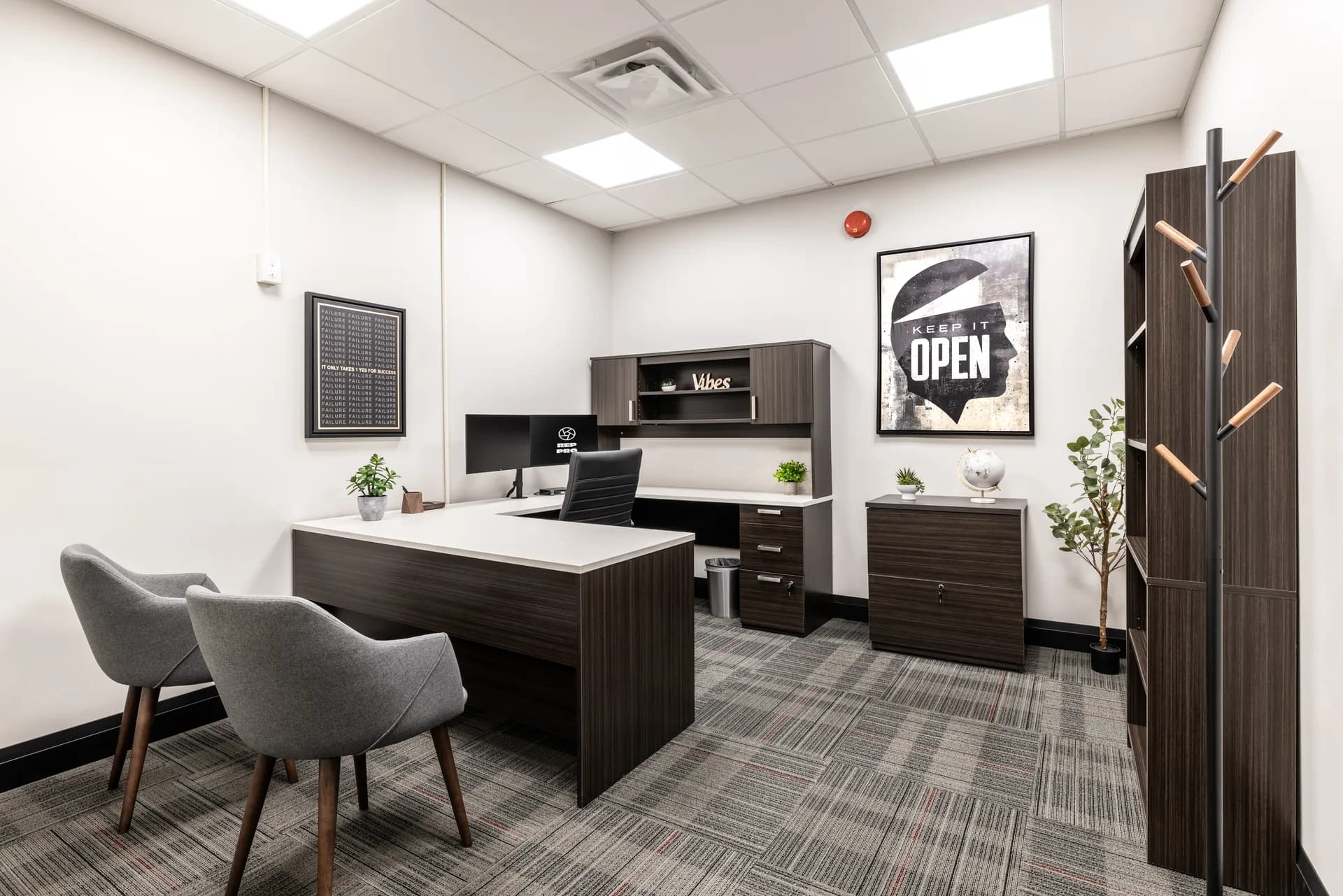 Private office with desk and seating